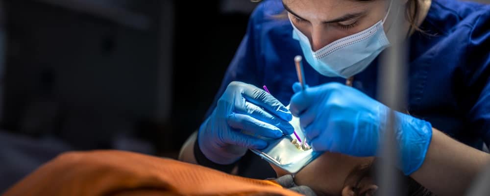 Dentist treating a patient at Dr White Dental Care